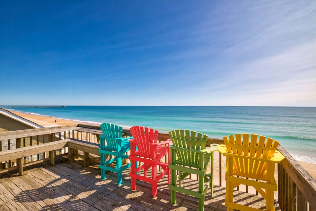 Colorful chairs on a beach deck